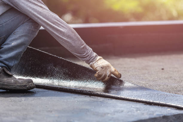 Professional Basement Waterproofing technician working in Point Pleasant Beach, NJ